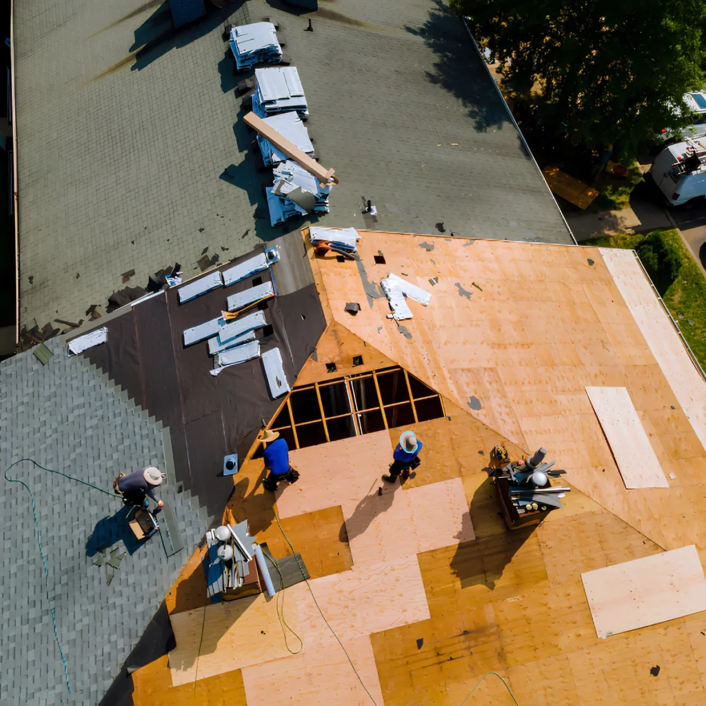 Image of a roofing contractor helping to build a home with high quality materials.